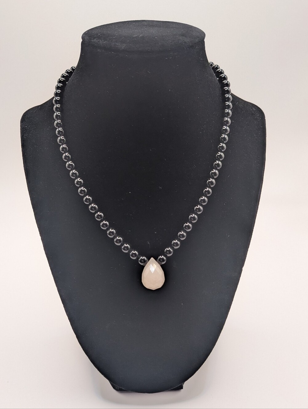Handmade Black Stone Beaded Necklace with White Teardrop Pendant